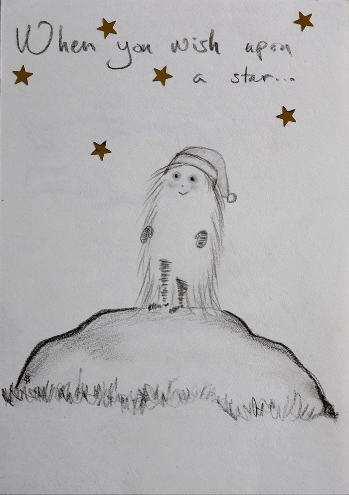 When you wish upon a star ... en tomte som står på en kulle med stjärnor i bakgrunden.